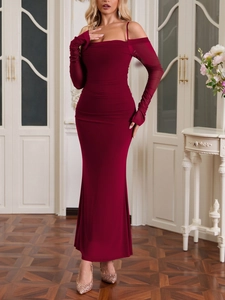 Detailed view of burgundy off-shoulder ruched dress with matching long sleeve gloves