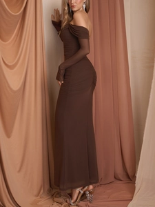Detail of off-shoulder mesh maxi dress in coffee brown with ruched bodycon textures