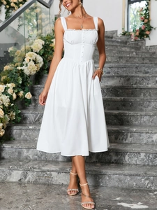 Close-up of white lace trim neckline and decorative buttons on a sleeveless midi dress