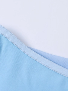 Detail view of light blue mesh fabric showing high-quality stitching and soft knitted texture