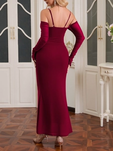 Detail of burgundy ribbed knit bodycon dress showing open back and off-shoulder mesh sleeves