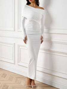 Close-up of white off-shoulder ruched dress with thumbhole sleeves and stretch fabric