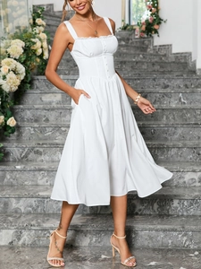 Detail of white lace-trimmed sleeveless dress with buttons and elegant A-line skirt