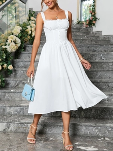 Detailed shot of white lace trim neckline and front buttons on a flowy A-line dress
