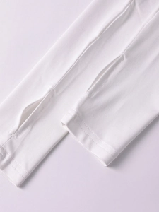 Detailed macro view of white sleeve cuffs featuring integrated thumbholes and flatlock seams