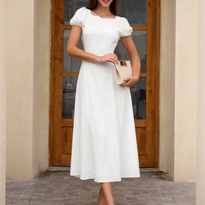 Elegant white backless midi dress with puff sleeves and A-line silhouette for summer holidays