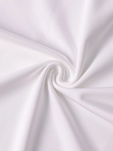 Close-up of premium white milk silk fabric showing elastic texture and smooth finish