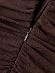 Detail view of the deep brown mesh fabric featuring ruched texture and invisible zipper closure