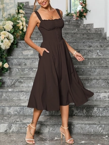 Detail of lace-trimmed square neckline and button-down front on coffee brown midi dress