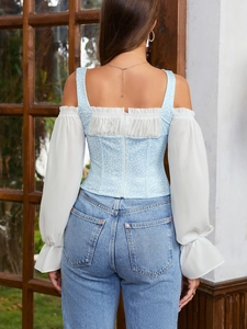 Detail view of the floral corset top back with a visible zipper and chiffon sleeves