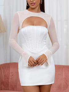 Detail of white satin corset dress with nude mesh shrug and sheer flared sleeves