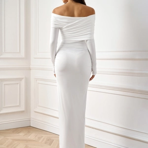 Elegant white off-shoulder long sleeve maxi dress with a slim fit and minimalist design