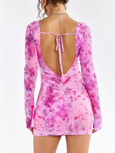 Detail showing the sexy open back with tie-up bow and pink tie-dye mesh fabric print