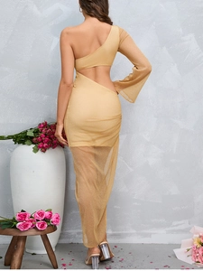 Detail of elegant gold one-shoulder dress with side cutout and sheer mesh skirt detail