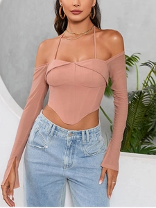 Detail of light purple corset top with mesh sleeves and flattering triangle hemline
