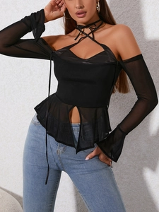Detail of sheer mesh flare sleeves and halter cutout on this black sexy long sleeve top