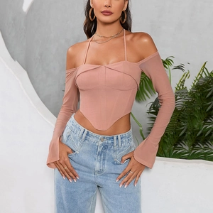 Sexy dusty pink corset style long sleeve top with halter neck and v-shaped hemline