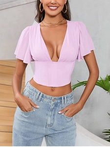 Detail of light purple chiffon corset top with deep V-neck and ruffled short sleeves