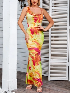 Close-up of abstract watercolor print dress with slim fit and halter neckline detail