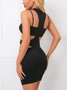 Detail of black halter dress showing open back cutout and side waist geometric design