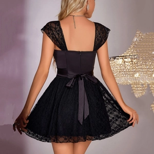 Sexy black lace mini dress with backless design and a satin bow for party occasions