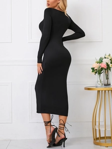 Macro detail of high-elastic black bodycon dress with long sleeves and slim fit silhouette