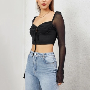 Sexy black mesh cutout crop top with bell sleeves and lace-up front detail