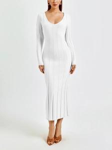 Detail shot of the vertical ribbed texture and U-neckline on this white knitted maxi dress