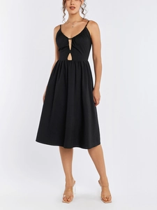 Detail of black camisole midi dress with pleated bust and front cutout design