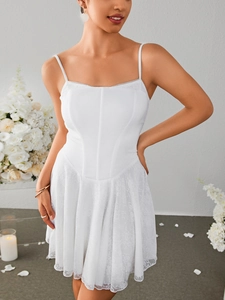 Detail of white corset bodice and floral lace skirt on this elegant A-line mini dress