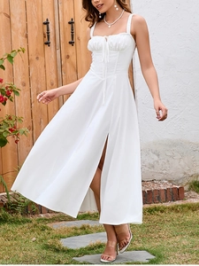 Detail of white backless maxi dress featuring drawstring bust and high side slit