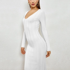 White ribbed knit maxi dress with a slim fit and V-neck design for elegant style