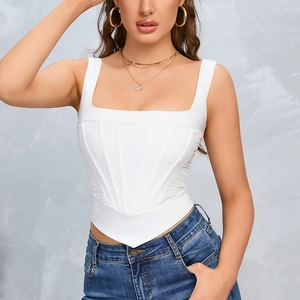 Slim fit white corset top with square neck and V-shaped hem paired with blue jeans