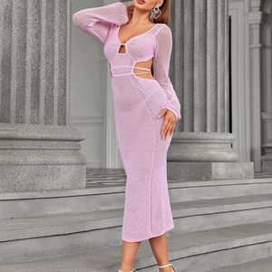 Pink knit long sleeve maxi dress featuring cut-out back and deep V-neckline