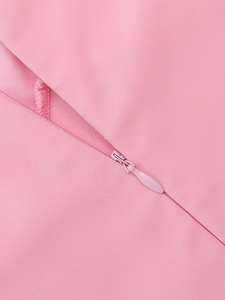 Detail of pink puff sleeve dress featuring a matching invisible zipper and woven fabric