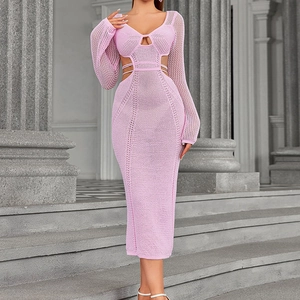 Pink crochet knit maxi dress with long sleeves, cut-out waist and tie-back details