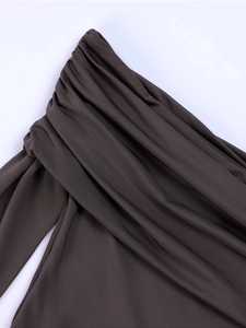Detail of ruched neckline on dark brown milk silk top with soft draping textures