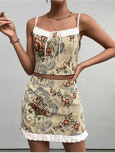 Detail of vintage floral jacquard crop top and mini skirt set with ruffle trim