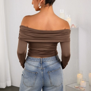Coffee brown off-the-shoulder long sleeve top with backless pleats and blue jeans