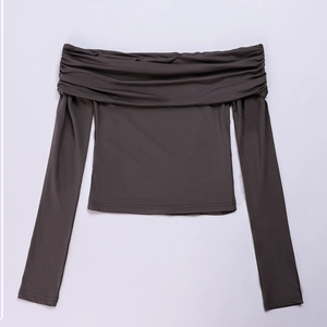 Long sleeve off-the-shoulder milk silk top with ruching details in dark grey color