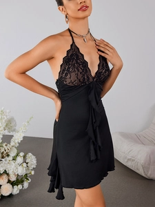 Detail of V-neck lace bodice and halter neck ties on this black sexy evening dress