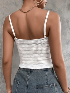 Detail of adjustable straps and back view of white crochet knit camisole top