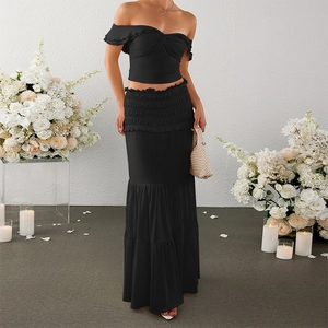 Elegant black off-shoulder crop top and tiered maxi skirt set for formal occasions