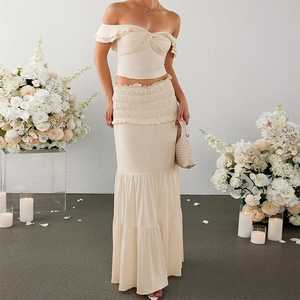 Off-shoulder milk silk two-piece crop top and tiered maxi skirt set in elegant cream white