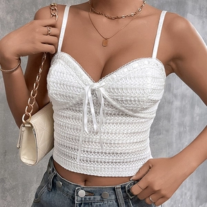 White lace knit camisole top with V-neck, ribbon bow and elegant hollow crochet details
