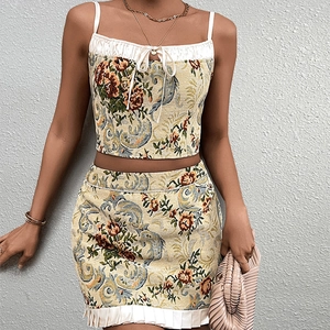 Floral jacquard two-piece set featuring camisole top and pleated mini skirt outfit