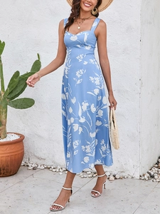 Close-up detail of light blue floral dress with thick straps and heart-shaped neckline