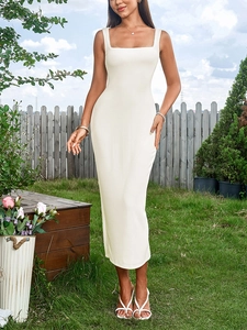 Detailed texture of white ribbed knit fabric on a slim fit maxi dress with square neckline