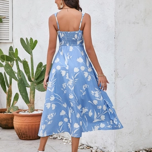 Floral print backless dress with a smocked back and spaghetti straps in blue