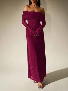 Detail of glittery off-shoulder neckline and flared sleeves on a purple sequin dress